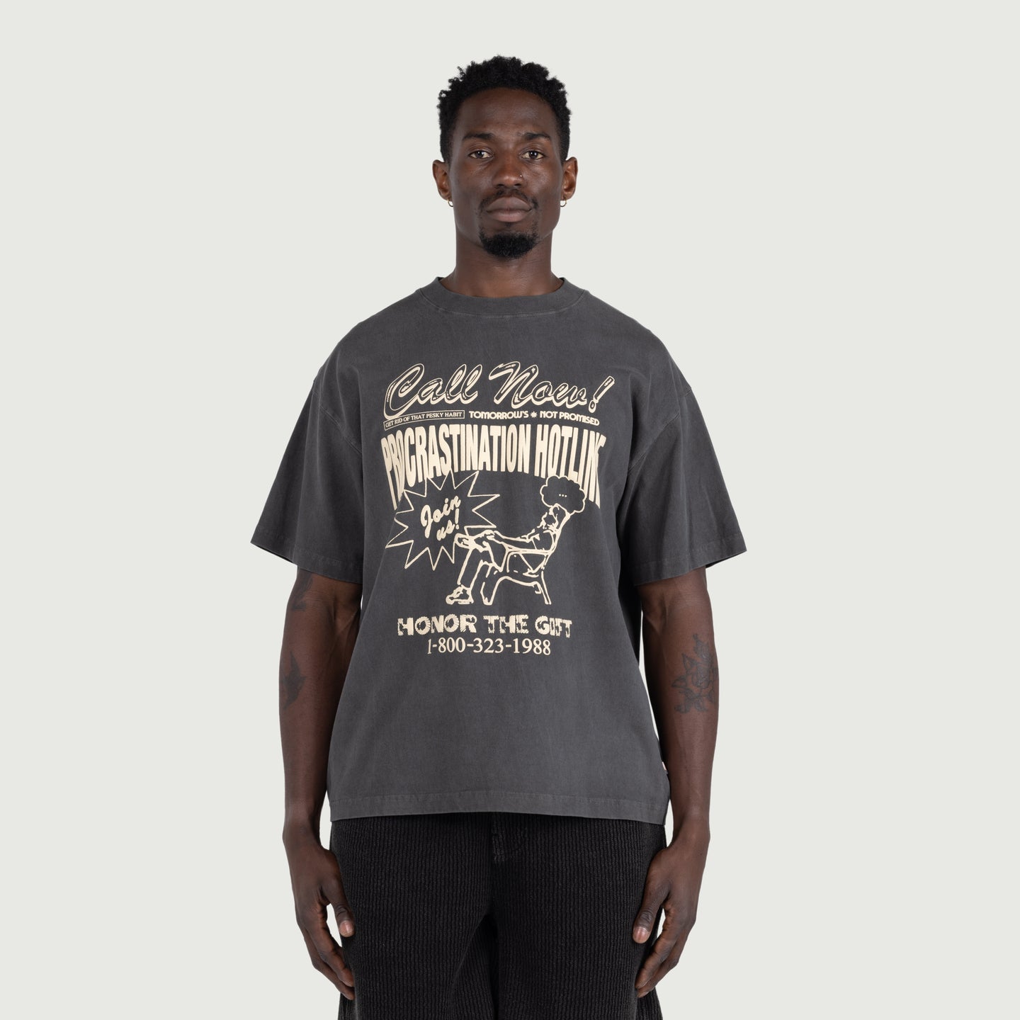 Procrastination Hotline Tee - Black