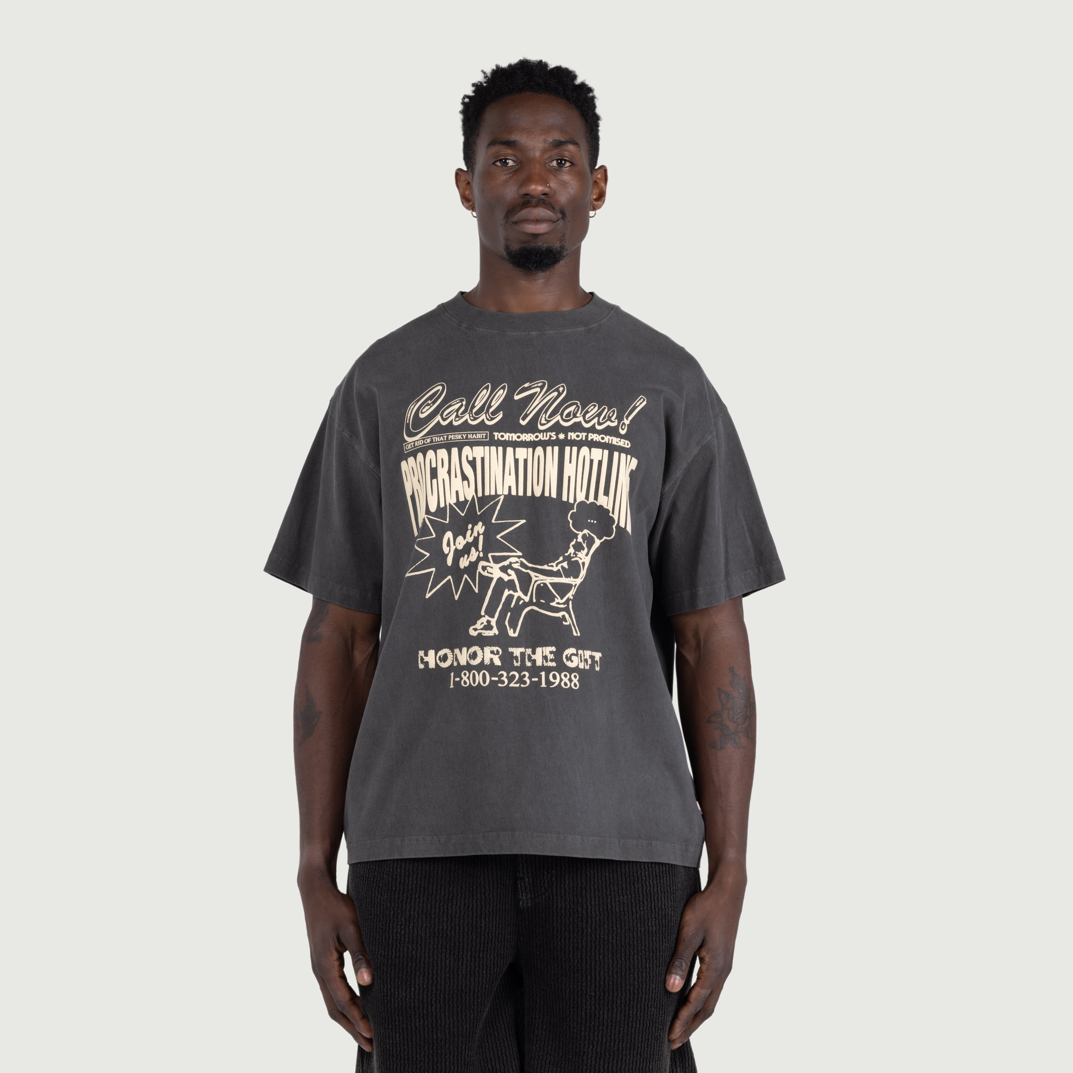 Procrastination Hotline Tee - Black